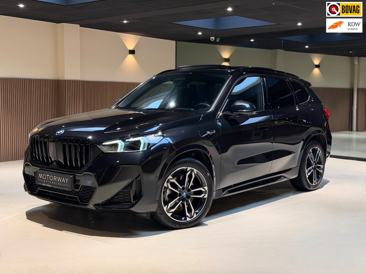 BMW X1 - XDrive30e|HUD|H&K|Massage|360|Pano|Keyless|Stuur+Stoel verwarming| - AutoWereld.nl
