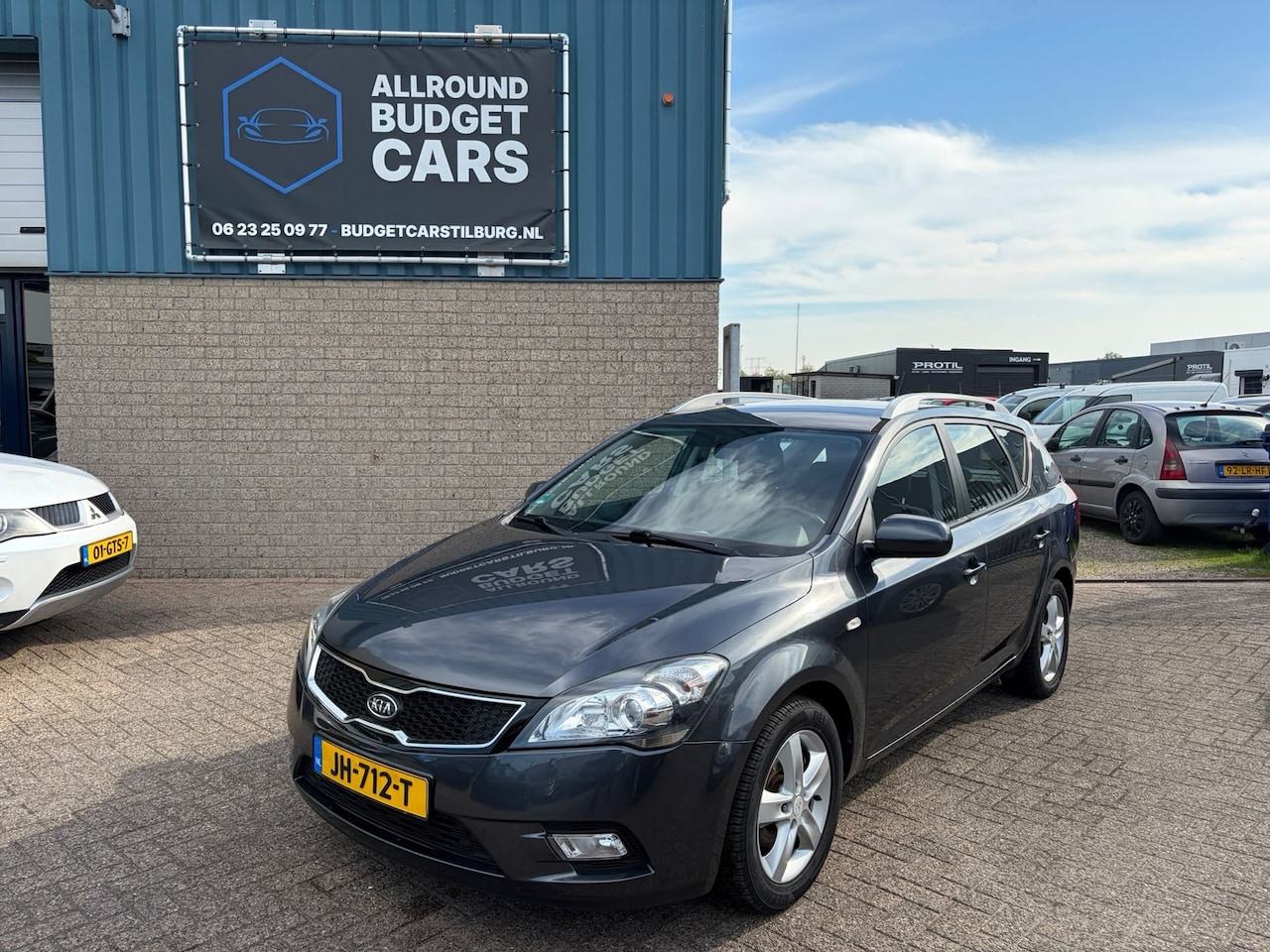Kia Cee'd Sporty Wagon - 1.4 CVVT X-tra 1.4 CVVT X-tra - AutoWereld.nl