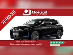 BMW iX - xDrive40 Executive 77 kWh Trekhaak - Panoramadak - Driving Assistant Professional - Harman