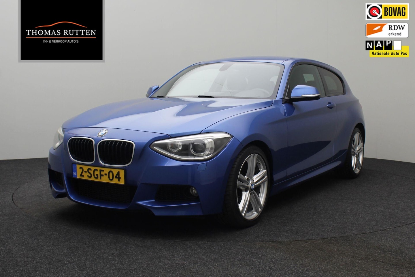 BMW 1-serie - 118i High Executive 2013 | Navigatie | Harman Kardon | Cruise Control | Airco | Stuurwiel - AutoWereld.nl