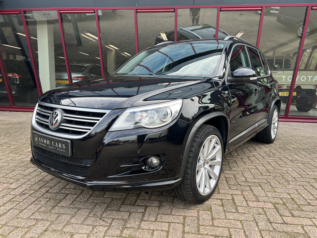 Volkswagen Tiguan - 1.4 TSI Sport&Style | R-line | Pano | Trekhaak | Airco | PDC | Navi | - AutoWereld.nl