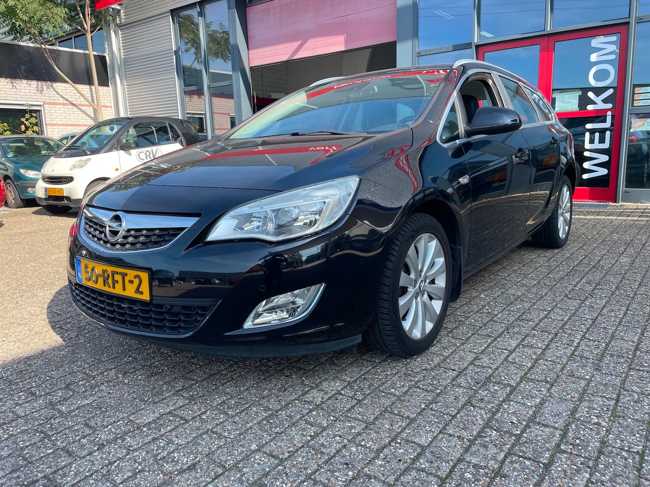 Opel Astra Sports Tourer - 1.4 Turbo Cosmo in top staat zeer goed onderhouden - AutoWereld.nl