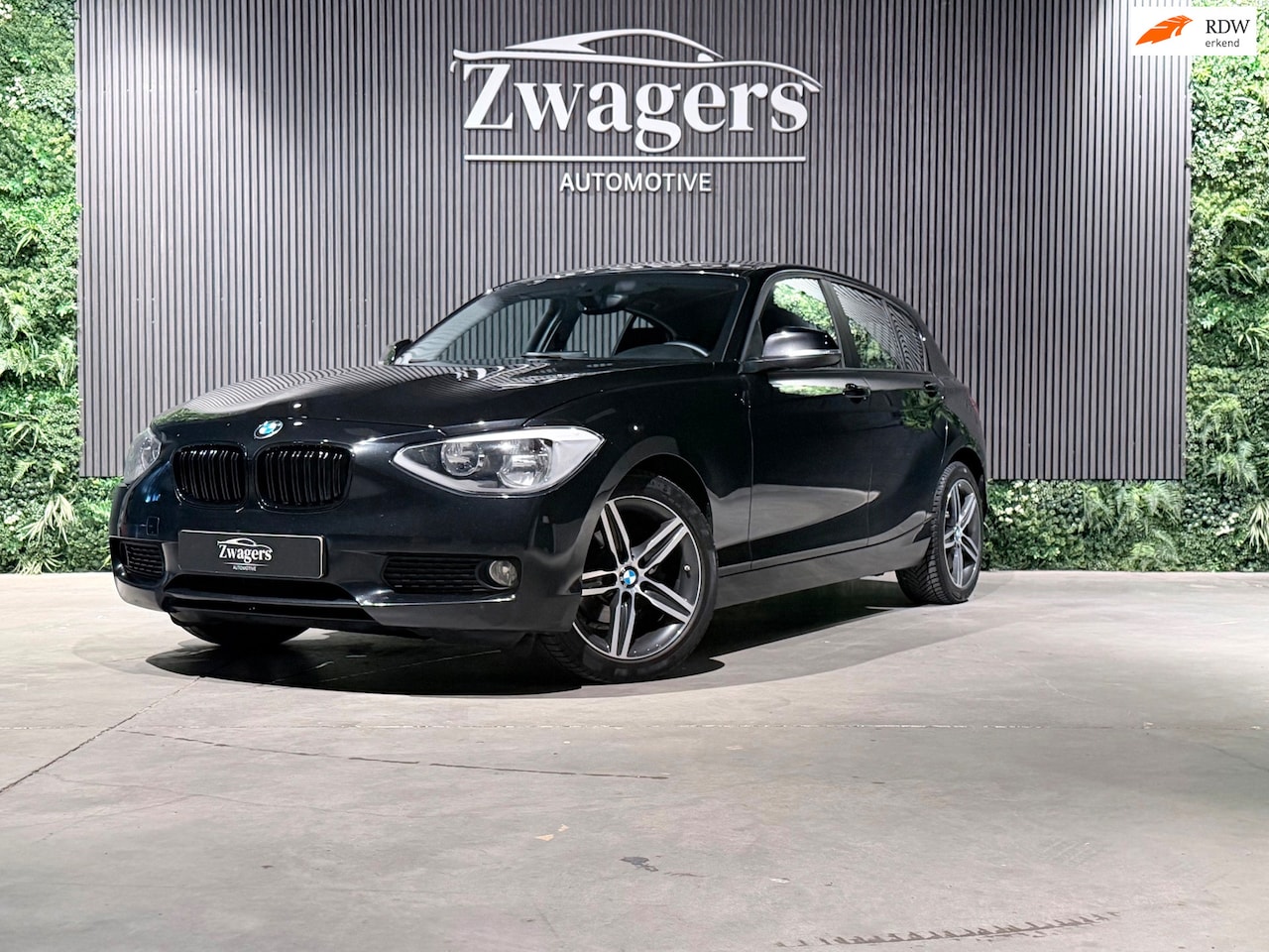 BMW 1-serie - 114i EDE High Executive| Navi | Stoelverwarming | Airco | - AutoWereld.nl