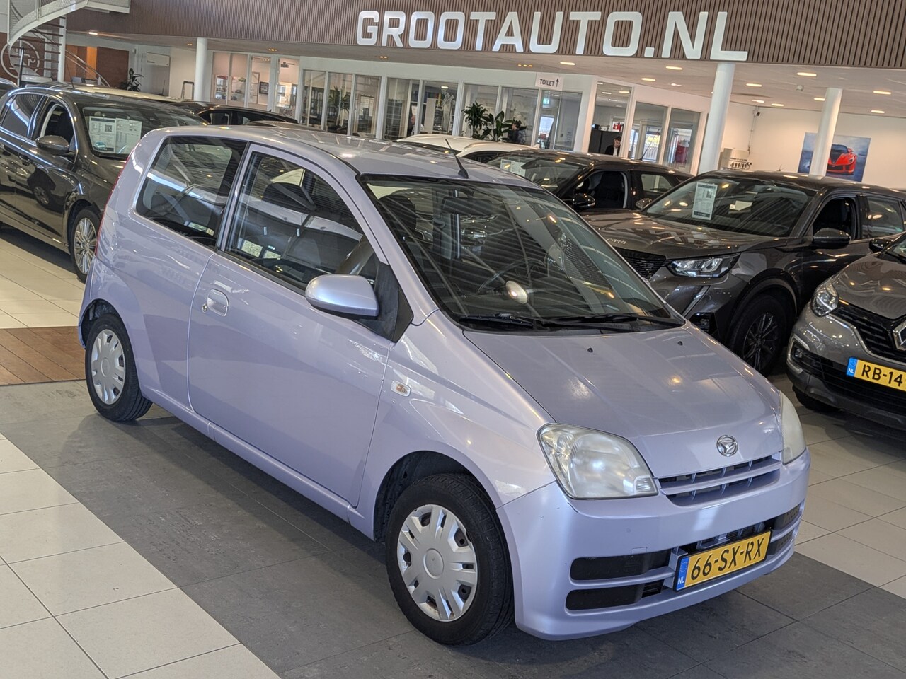 Daihatsu Cuore - 1.0-12V Sporty Automaat Airco, Stuurbekrachtiging - AutoWereld.nl