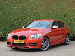 BMW 1-serie - M135i xDrive High Executive | M Performance uitlaat | Valencia orange