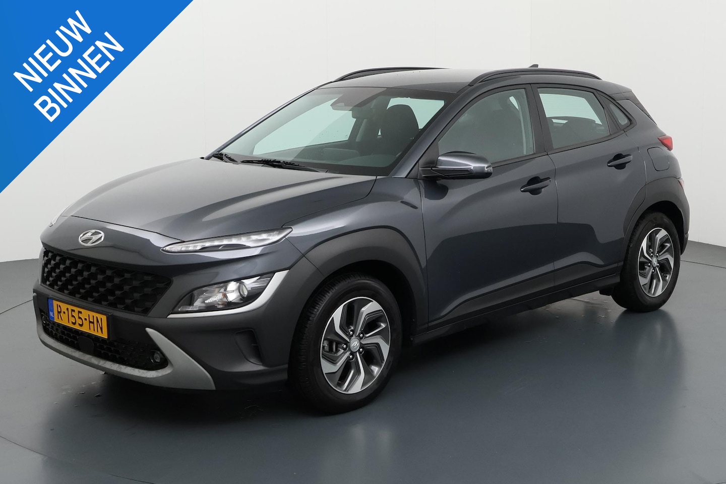 Hyundai Kona - 1.6 GDI HEV COMFORT PACK I AUTOMAAT I TREKHAAK I P-CAMERA I APPLE CARPLAY - AutoWereld.nl
