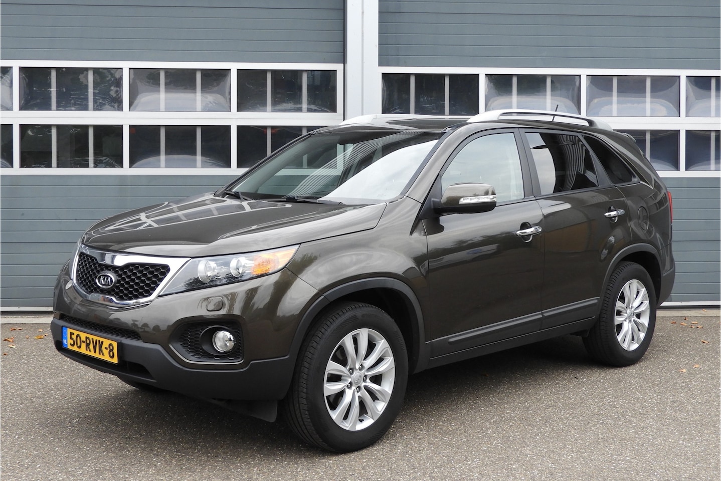 Kia Sorento - 2.4 AUT | LEDER | CRUISE | NAVI | AIRCO | STOELVERWARMING | PARKEERSENSOREN - AutoWereld.nl