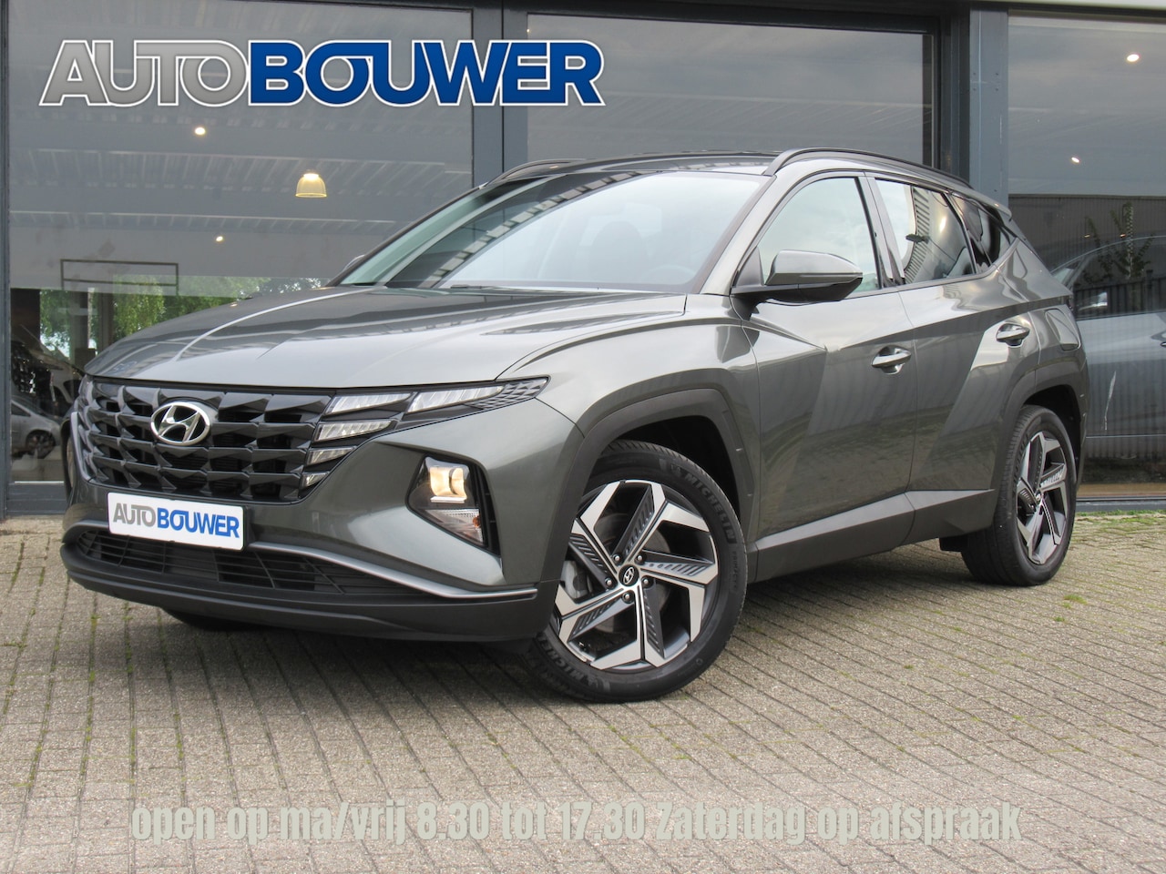 Hyundai Tucson - 1.6 T-GDI PHEV 265 PK 4WD 1e eigen | dealer onderh | navi | 19"inch | camera | cruise - AutoWereld.nl