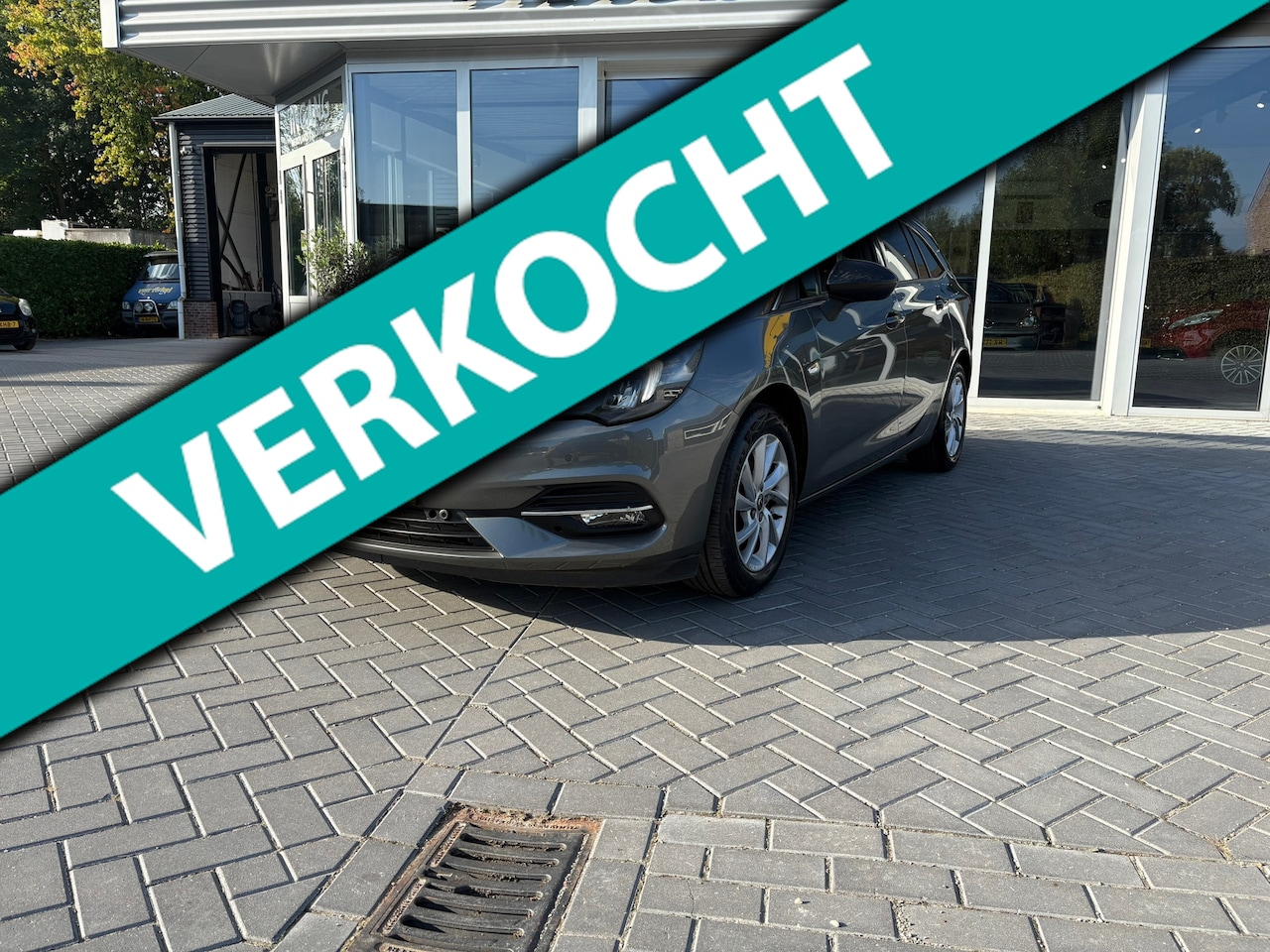 Opel Astra Sports Tourer - 1.2 Business Elegance 1.2 Business Elegance - AutoWereld.nl
