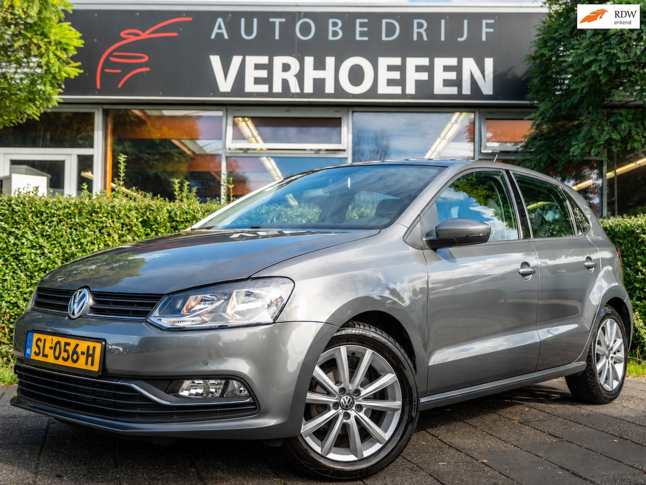 Volkswagen Polo - 1.2 TSI Highline | CRUISE / CLIMATE CONTR | PARKEER SENS VOOR EN ACHTER | BT | 5 DEURS ! - AutoWereld.nl