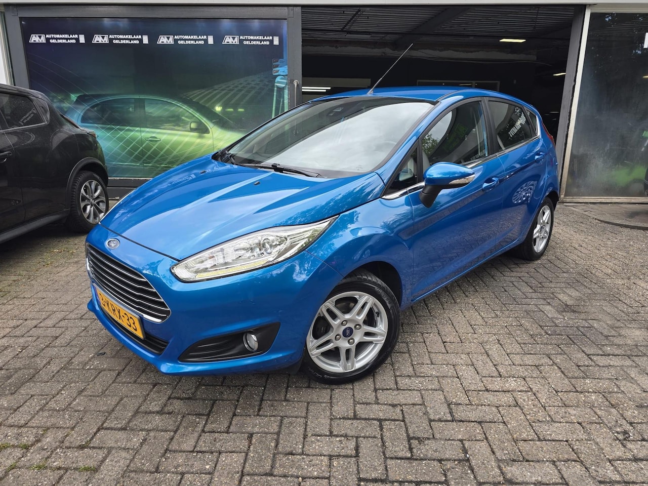 Ford Fiesta - 1.0 EcoBoost Titanium | 2E EIGENAAR |3/6 OF 12MND GARANTIE | CRUISE | NAVI | LMV | PDC | - AutoWereld.nl