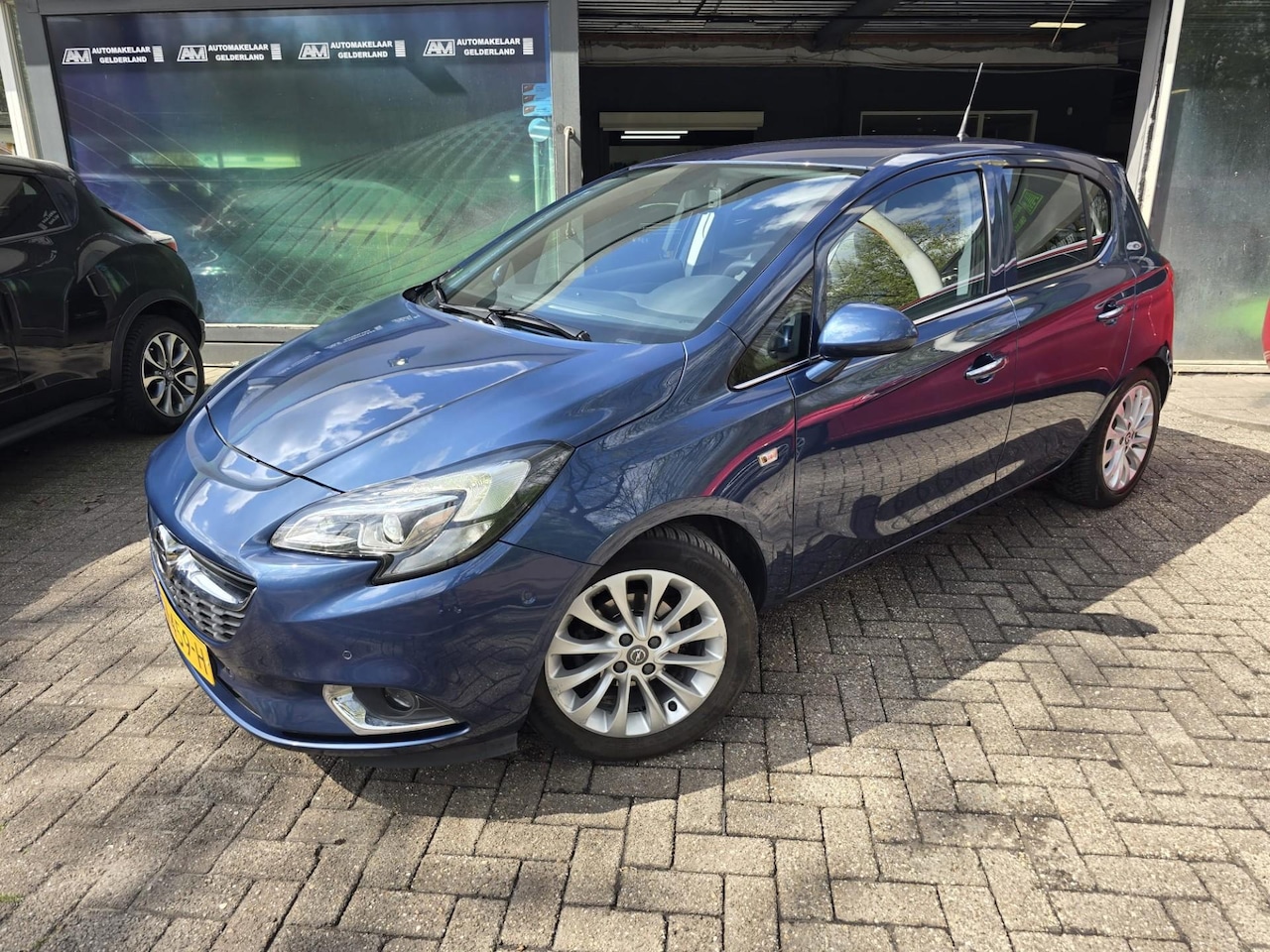 Opel Corsa - 1.4 Cosmo | AUTOMAAT | 12MND GARANTIE | CAMERA | STOEL-STUURVERWARMING | - AutoWereld.nl