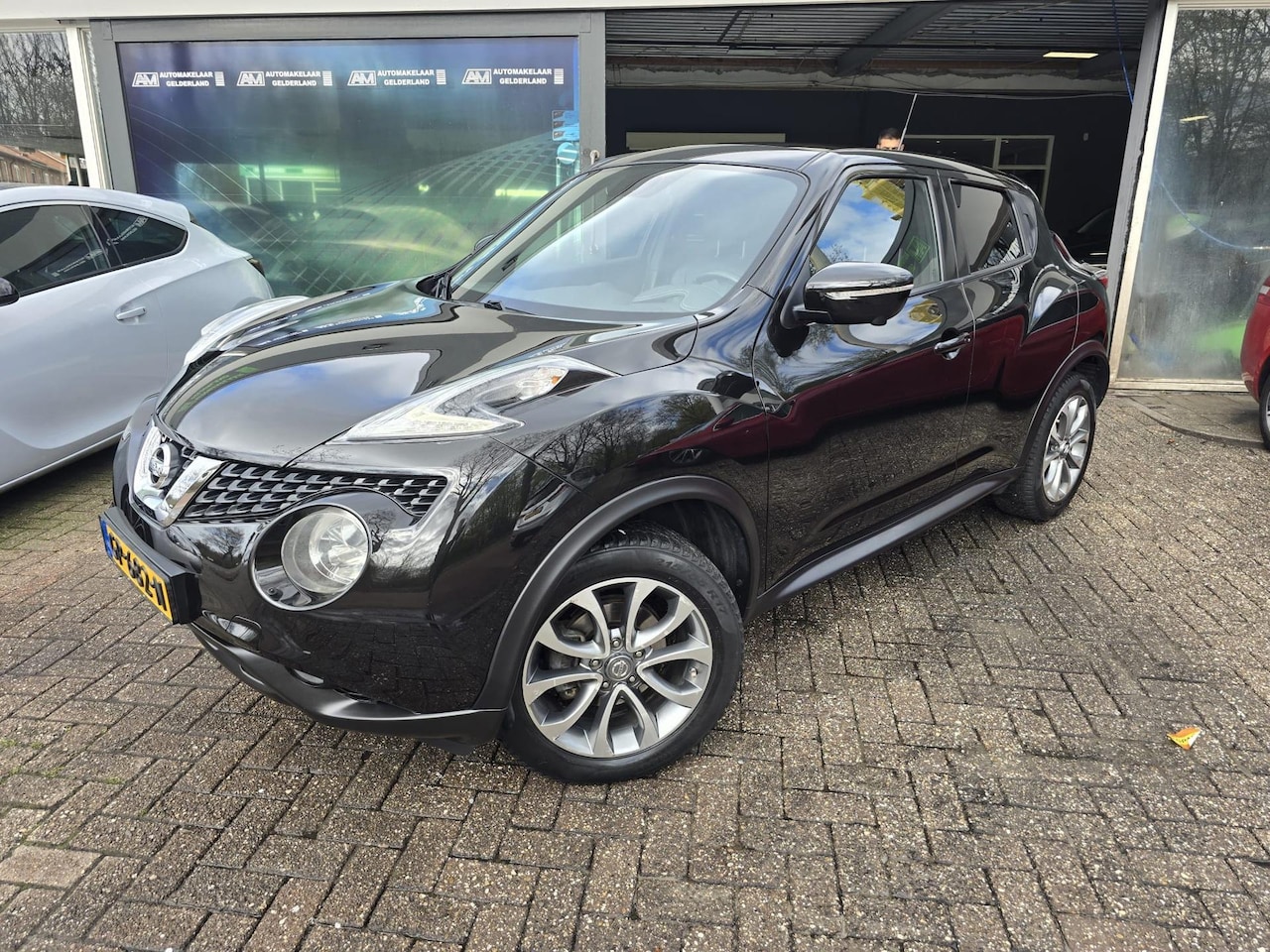 Nissan Juke - 1.5 dCi S/S Tekna | 2E EIGENAAR | 3/6 OF 12MND GARANTIE | LEDER | PANO DAK | TREKHAAK | - AutoWereld.nl