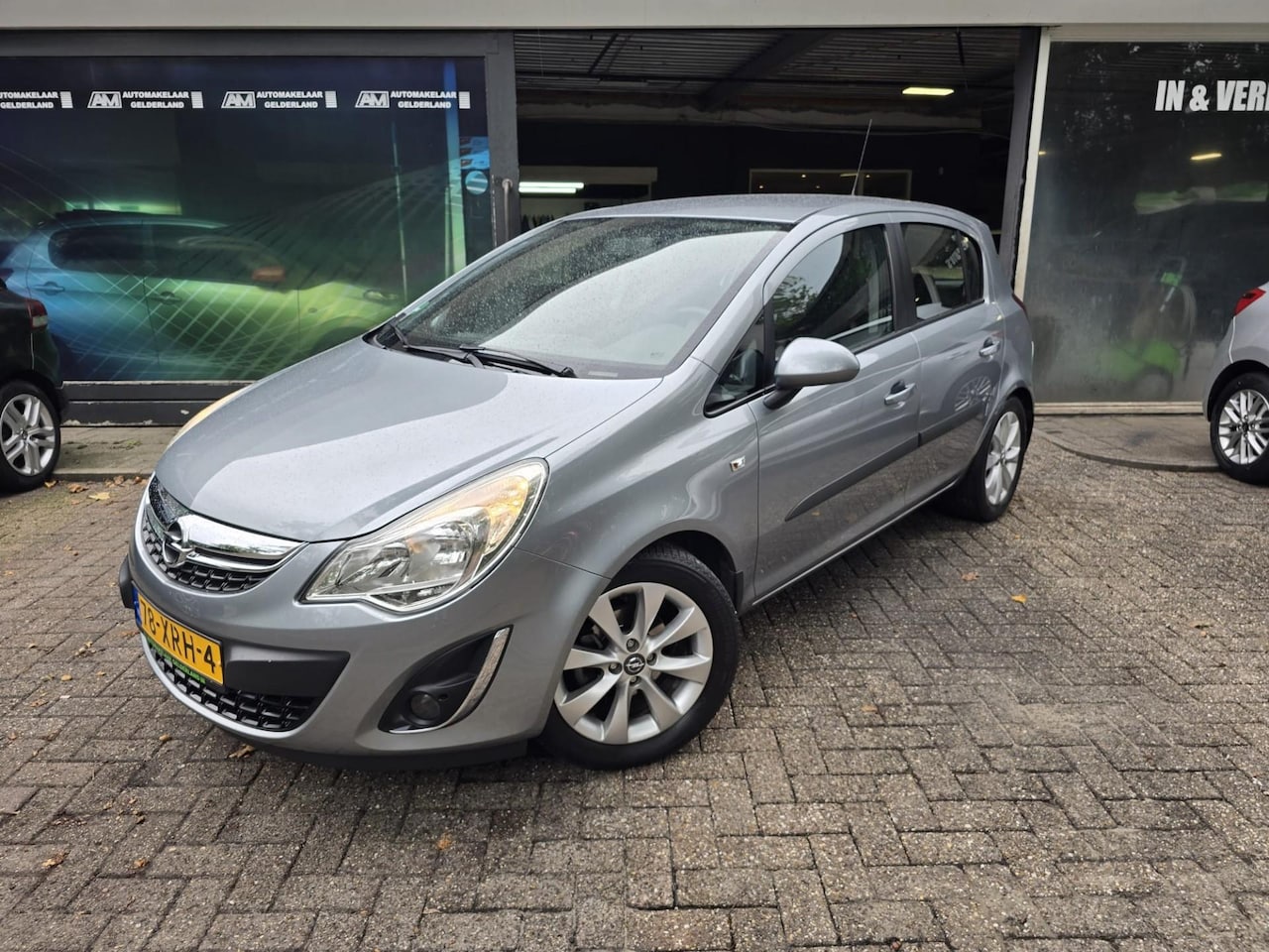 Opel Corsa - 1.4-16V Anniversary Edition | 1E EIGENAAR | 3/6 OF 12MND GARANTIE | AIRCO | NAVI | LMV | - AutoWereld.nl