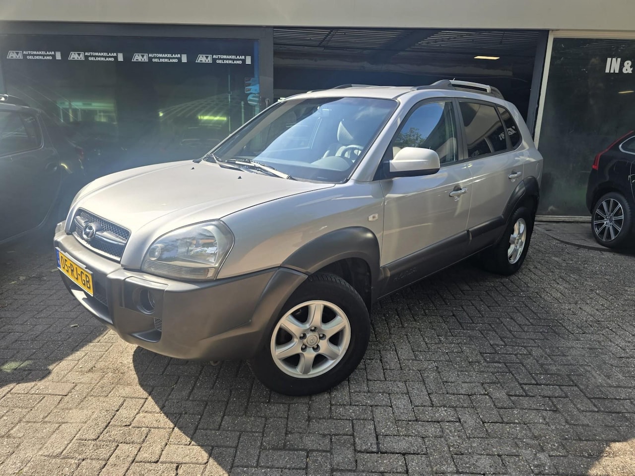 Hyundai Tucson - 2.0i Dynamic | NIEUWE APK |3/6 OF 12 MND GARANTIE | AIRCO | ELEC RAMEN | - AutoWereld.nl