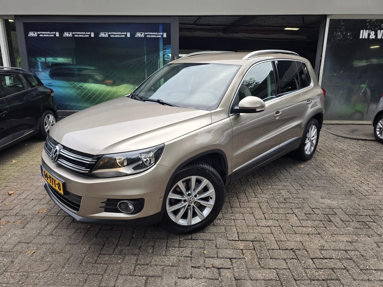 Volkswagen Tiguan - 1.4 TSI Sport&Style | 3/6 OF 12MND GARANTIE | NAVI | TREKHAAK | CRUISE | LMV | - AutoWereld.nl
