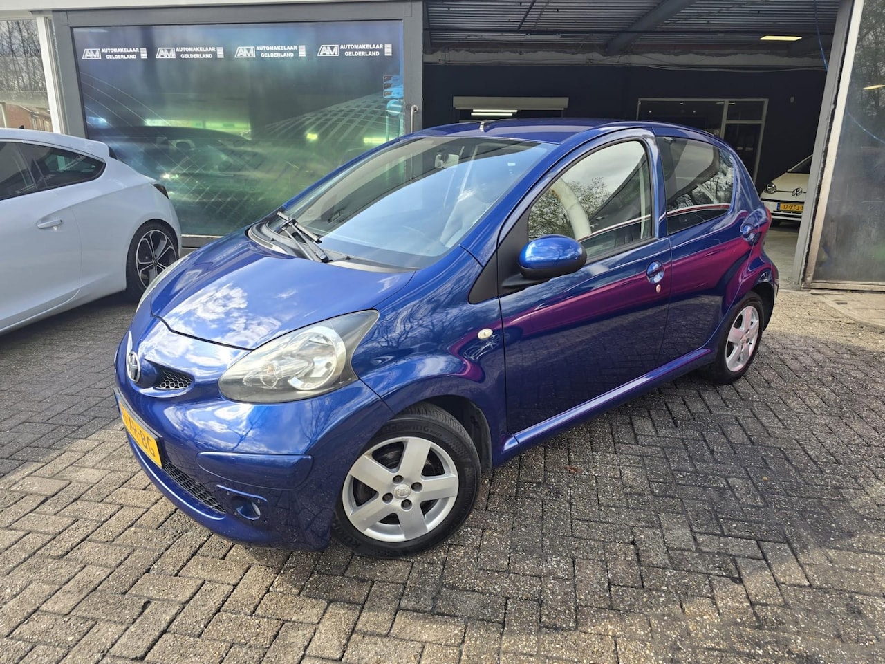 Toyota Aygo - 1.0-12V Sport | 2E EIGENAAR | 3/6 OF 12MND GARANTIE | AIRCO | NW APK | ELEC PAKKET | LMV | - AutoWereld.nl