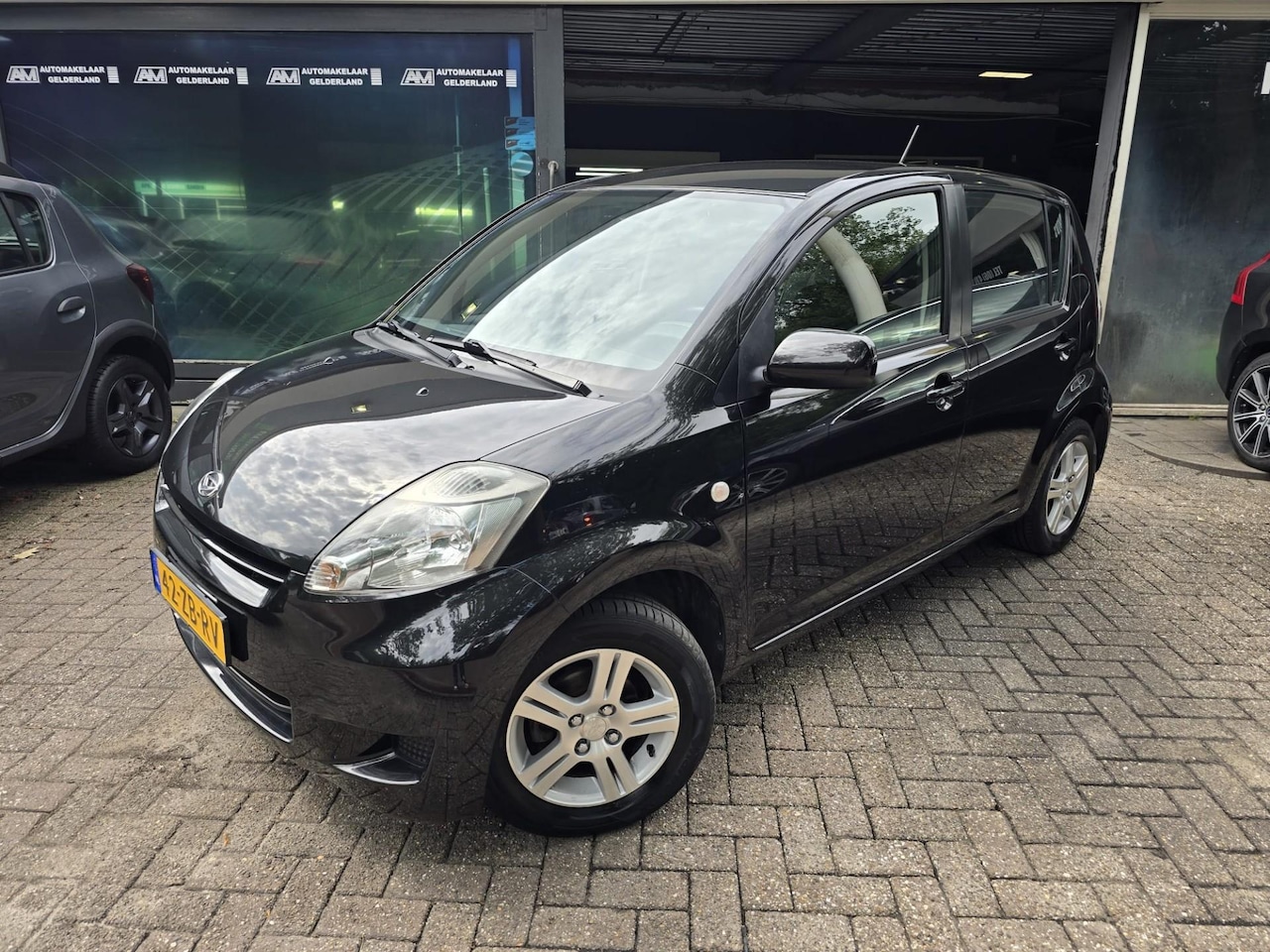 Daihatsu Sirion 2 - 1.0-12V Premium | 1E EIGENAAR |3/6 OF 12MND GARANTIE | AIRCO | ELEC RAMEN | LMV | - AutoWereld.nl