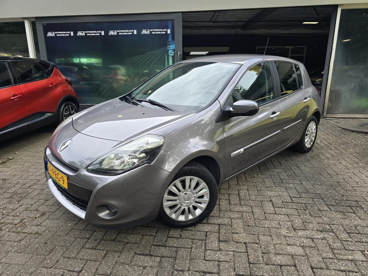 Renault Clio - 1.2 Collection | 2E EIGENAAR | 3/6 OF 12MND GARANTIE | LAGE KM | NAVI | AIRCO | CRUISE | L - AutoWereld.nl