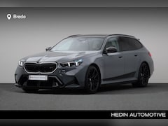 BMW 5-serie Touring - M5 | Akrapovic trapezium uitlaat | M Drive Professional | M Carbon keramische rem | Trekha