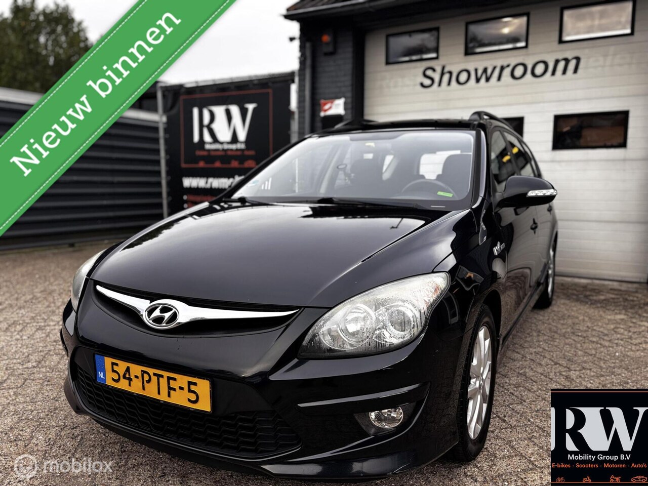 Hyundai i30 CW - 1.6i i-Motion *NAP*AIRCO*TREKHAAK*PDC* - AutoWereld.nl