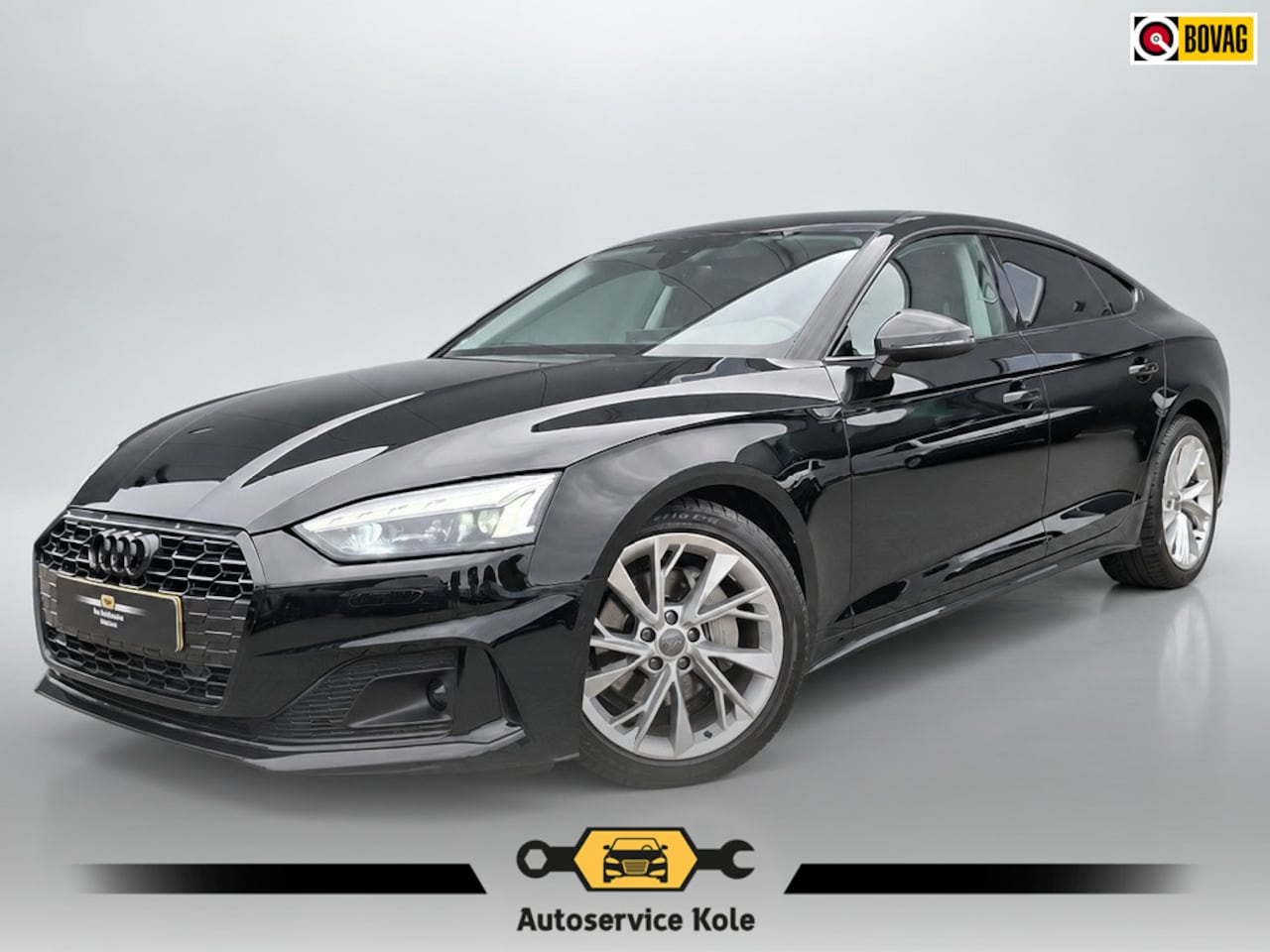 Audi A5 Sportback - 40 TFSI Business Edition * Navigatiesysteem * AUTOMAAT * Elektrische kofferklep * - AutoWereld.nl