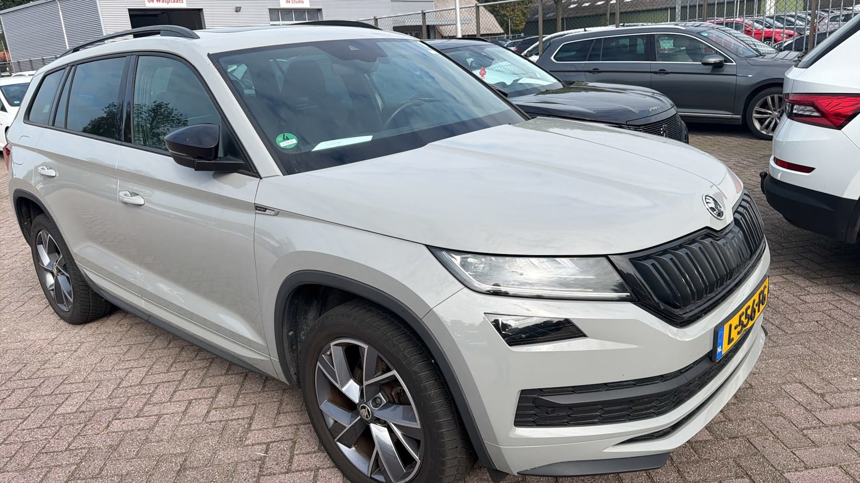 Skoda Kodiaq - 1.5 TSI Sportline Business Handgeschakeld | Airco | Navigatie | Vol opties | Elek. Pakket - AutoWereld.nl