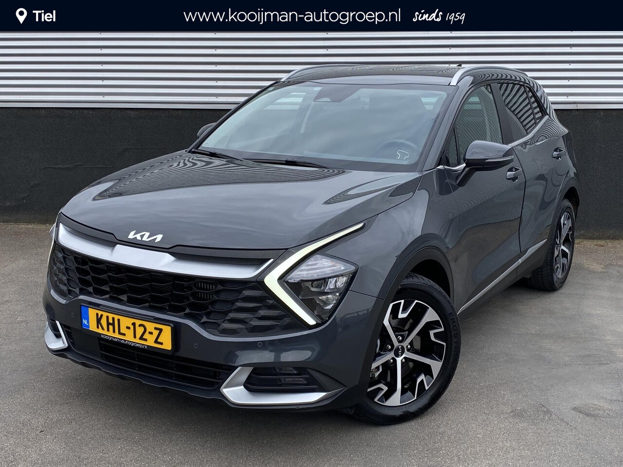 Kia Sportage - 1.6 T-GDi Hybrid DynamicLine Parkeersensoren, navigatie Appel CarPlay/Android Auto, achter - AutoWereld.nl