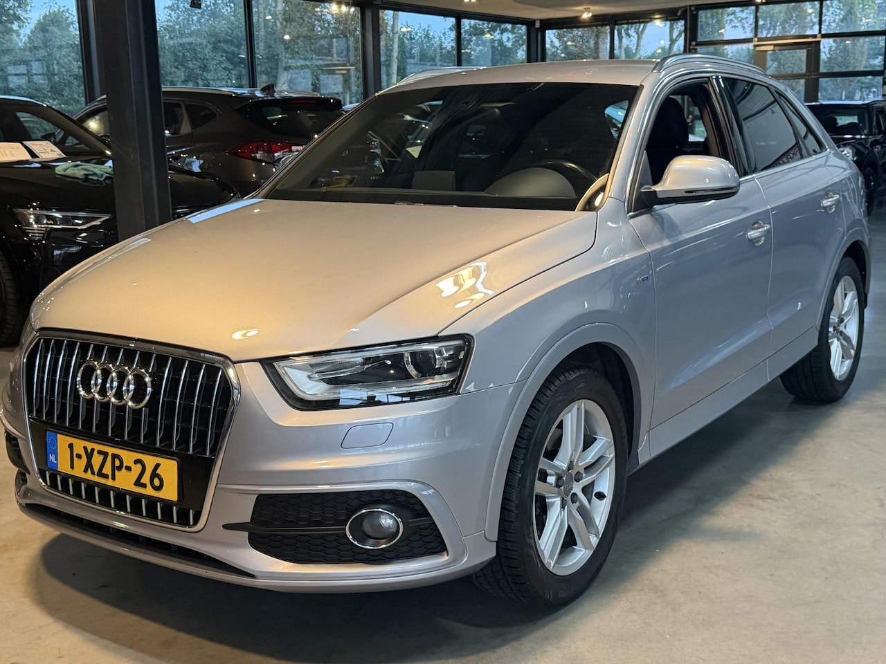 Audi Q3 - 1.4 TFSI 110Kw S-Line Sport Edition 150Pk - AutoWereld.nl