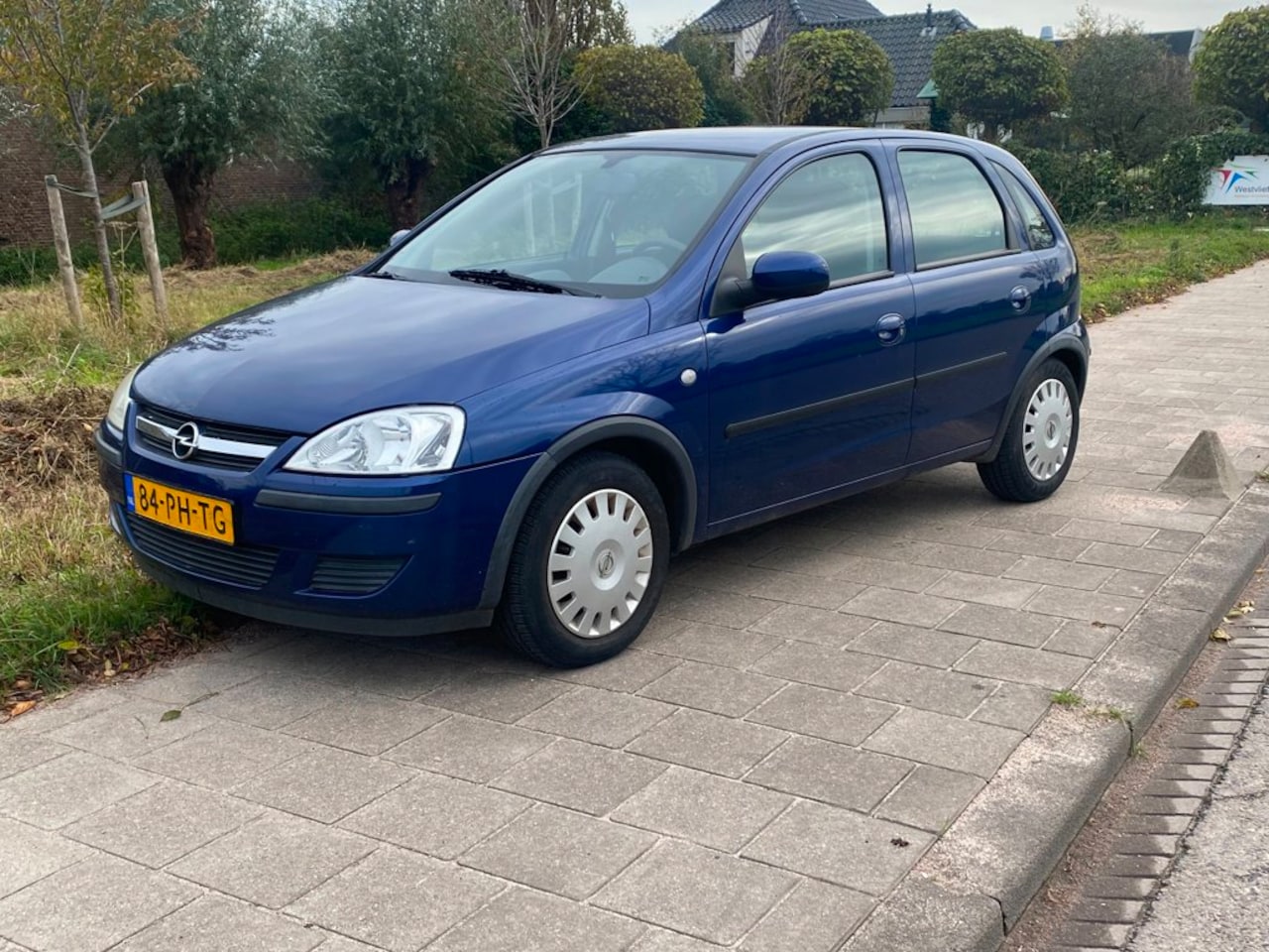 Opel Corsa - 1.2-16V Enjoy 1.2-16V Enjoy - AutoWereld.nl