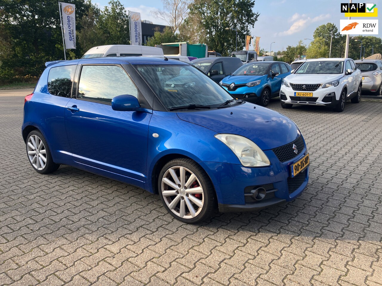Suzuki Swift - 1.6 Sport RIJDTGOED!/LEER/AIRCO/NAVI/CLIMATE - AutoWereld.nl