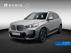 BMW iX1 - eDrive20 M Sportpakket | Premium Pack | Travel Pack | SoH 100% | Trekhaak | Panoramadak |