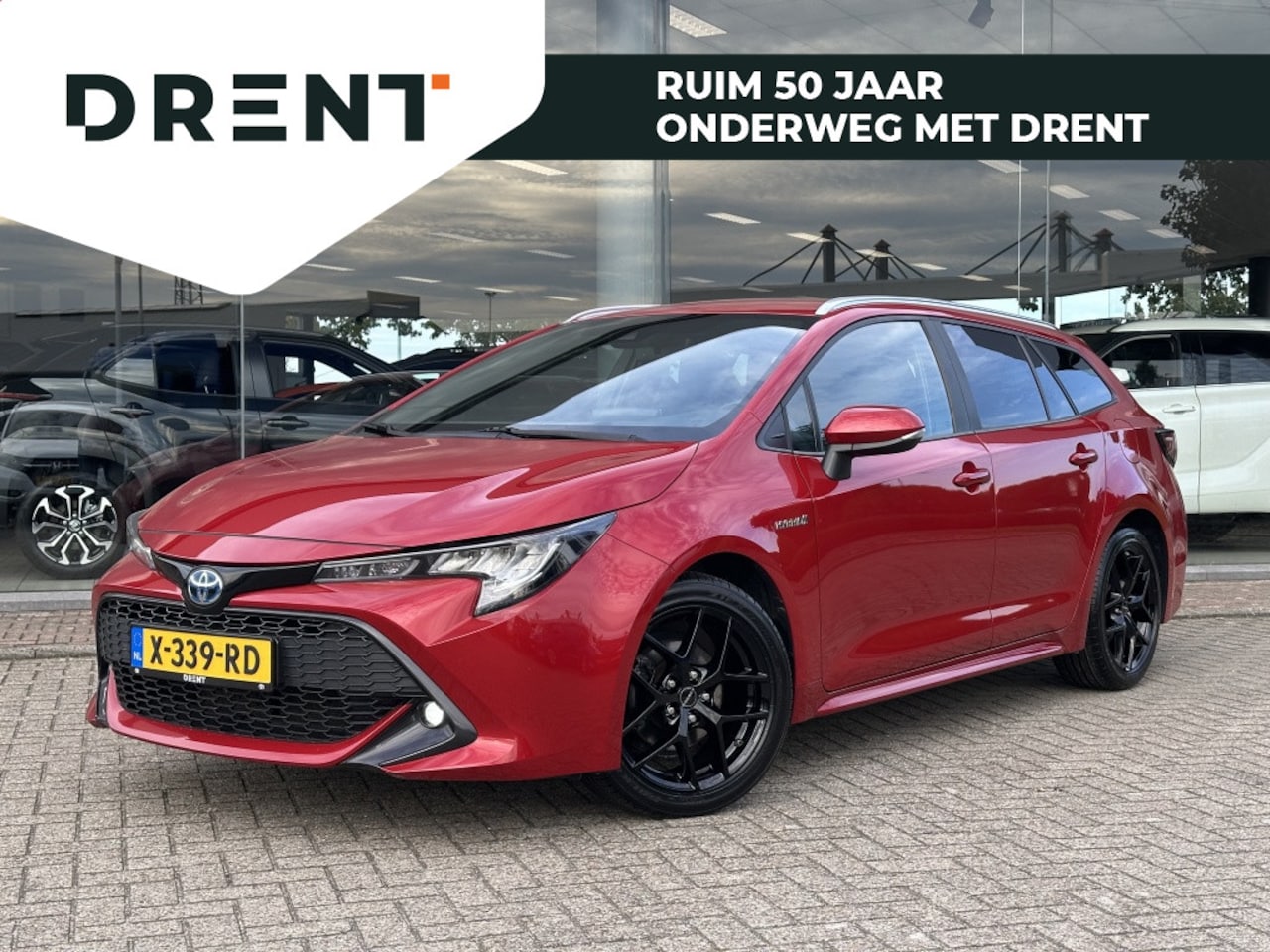 Toyota Corolla Touring Sports - 1.8 Hybrid Dynamic | HUD | El. Achterklep | Stoel-Stuurverwarming | Keyless Entry - AutoWereld.nl