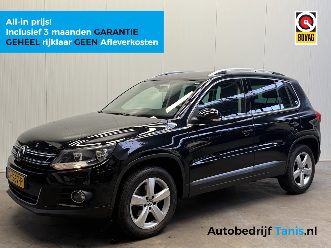 Volkswagen Tiguan - 2.0 TDI Sport&Style 4Motion NAVI-AIRCO/ECC-TREKHAAK-PDC-CRUISE - AutoWereld.nl