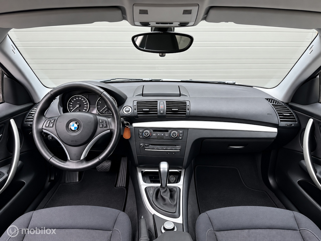 BMW 1-serie - 120i High Executive|Automaat|Navi|Cruis|LM|170PK - AutoWereld.nl