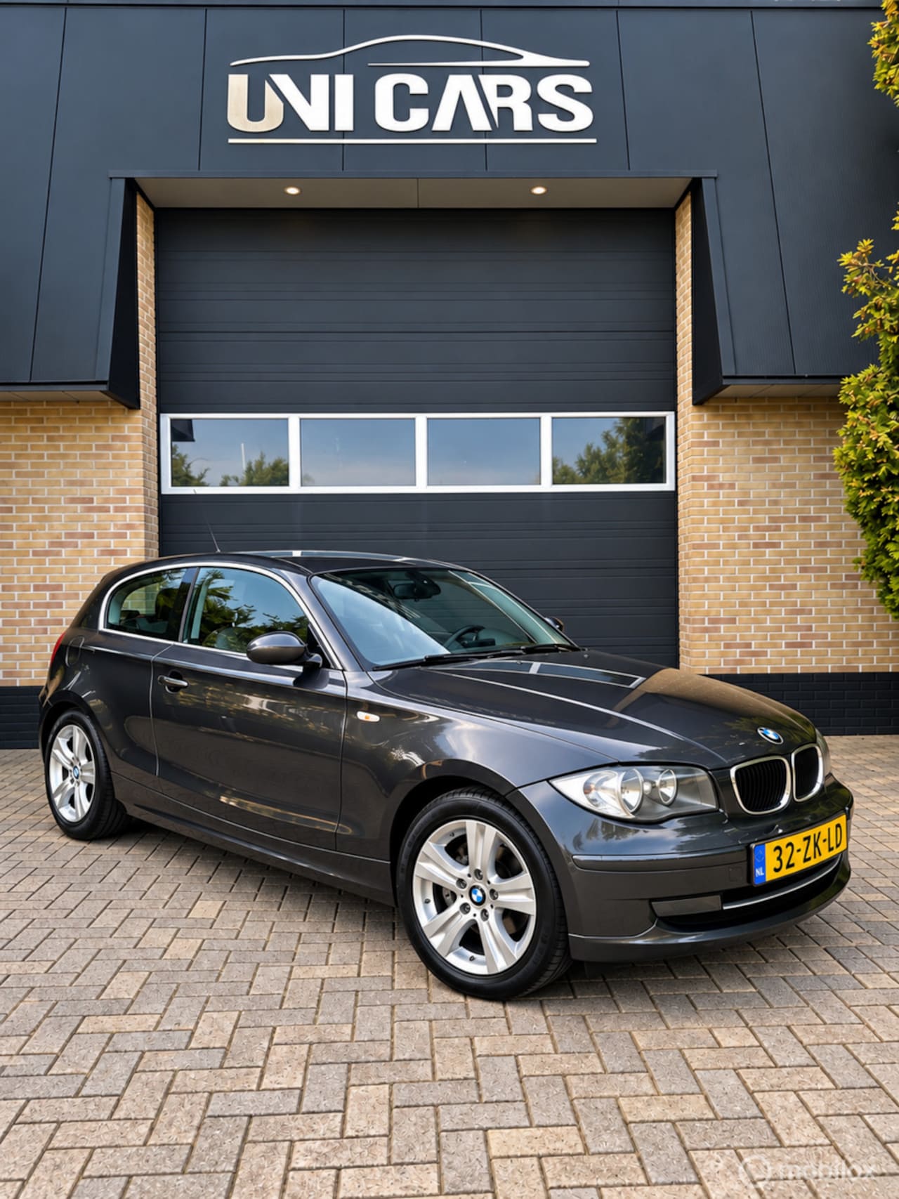 BMW 1-serie - 120i High Executive|Automaat|Navi|Cruis|LM|170PK - AutoWereld.nl