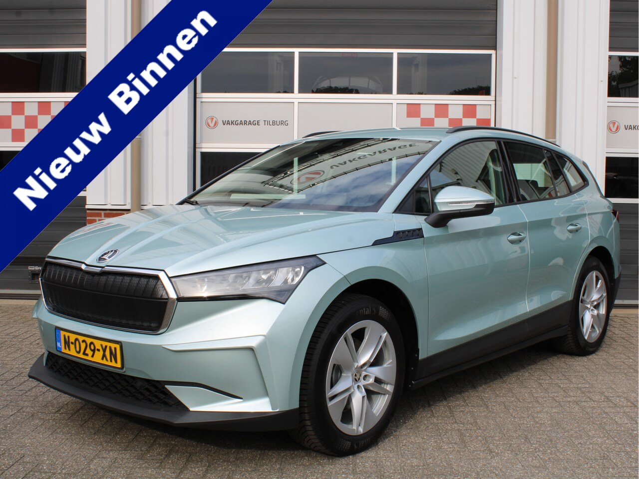 Skoda Enyaq iV - 60 SOH 91,7%/Carplay/Navi/Cruise/Half Leer/PDC/Standkachel - AutoWereld.nl