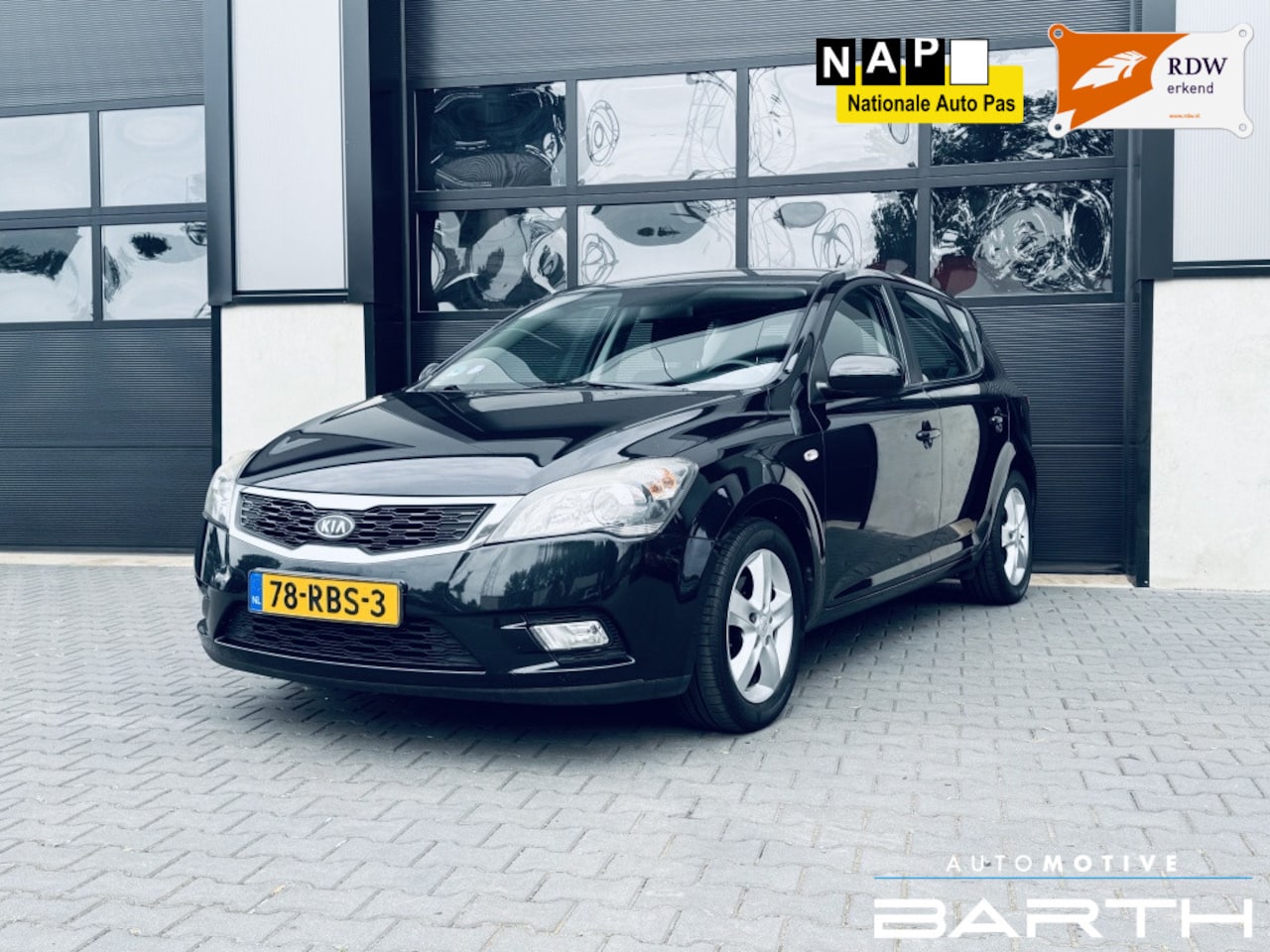 Kia Cee'd - 1.4 CVVT Seven | Airco | Cruise | NAP | APK | - AutoWereld.nl