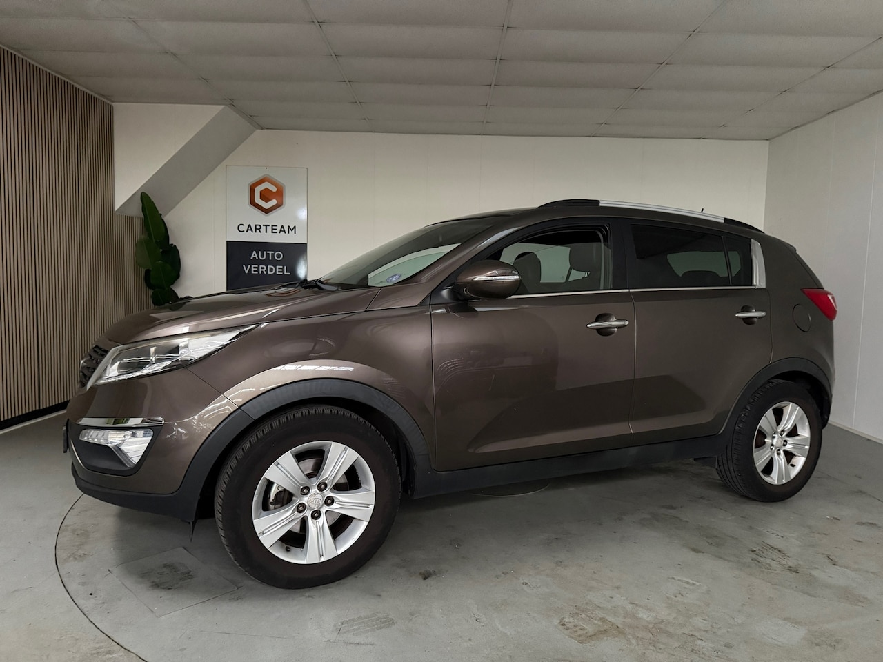 Kia Sportage - 1.6 GDI X-ecutive Plus Pack Airco, Trekhaak, LMV, Navigatie - AutoWereld.nl