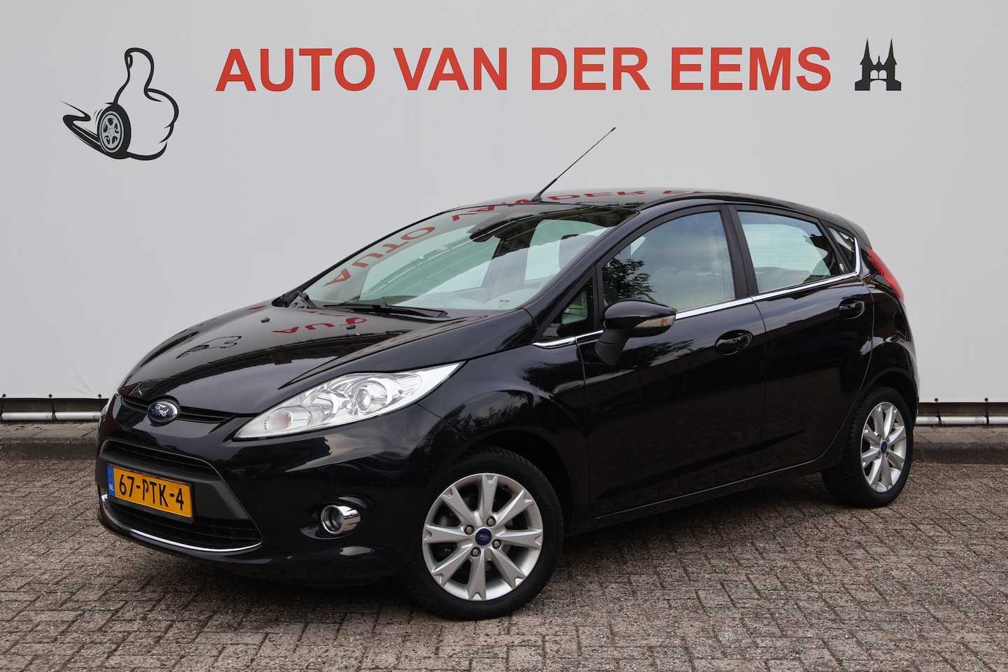 Ford Fiesta - 1.4 Ghia Automaat / NL-auto / Clima / Cruise / Pdc / Trekhaak - AutoWereld.nl