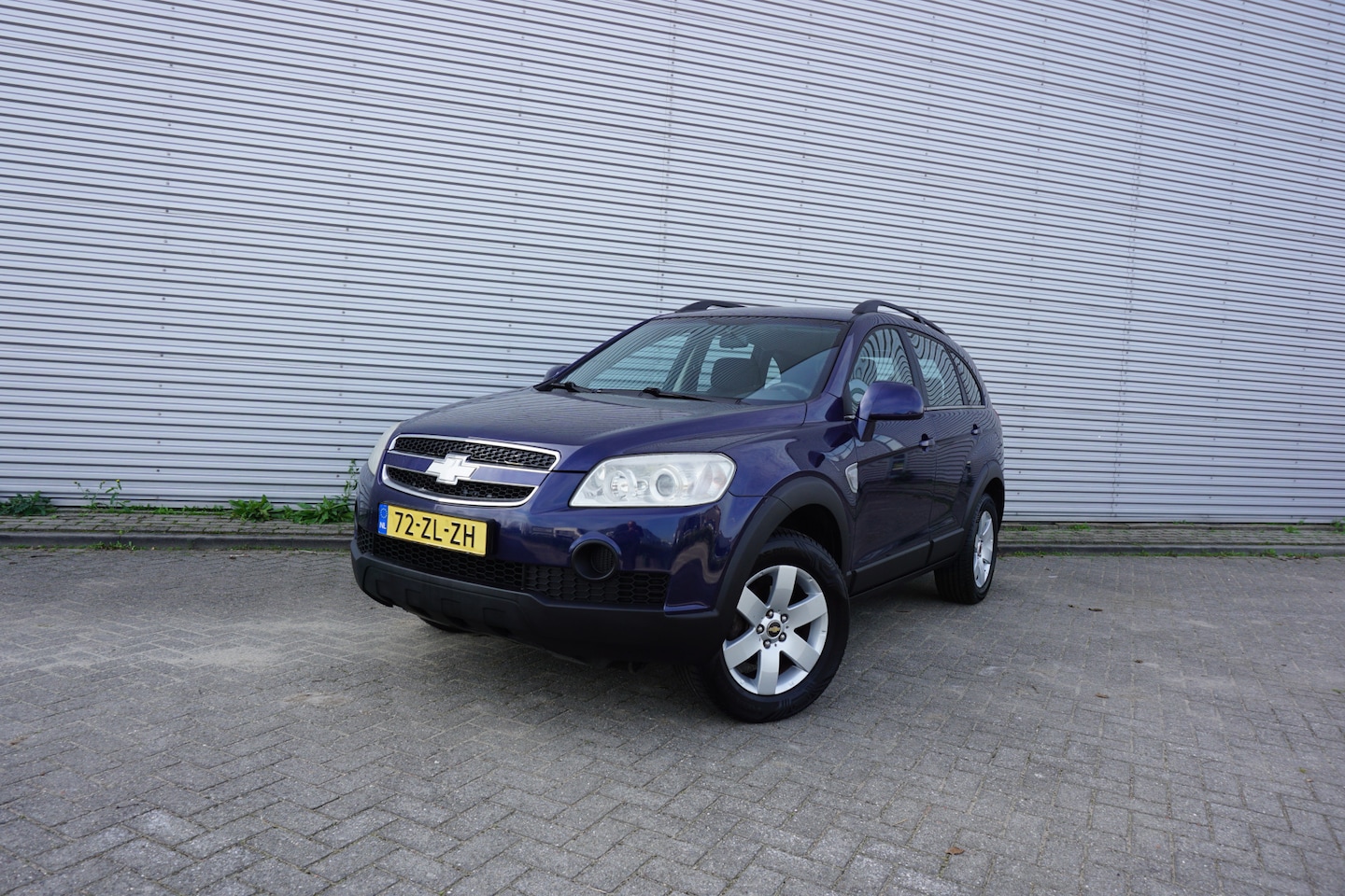 Chevrolet Captiva - 2.4i Style 2WD 7p Airco / Elektr. ramen / Cruise / Parkeers. / Lm velgen / NAP / Apk t/m 0 - AutoWereld.nl