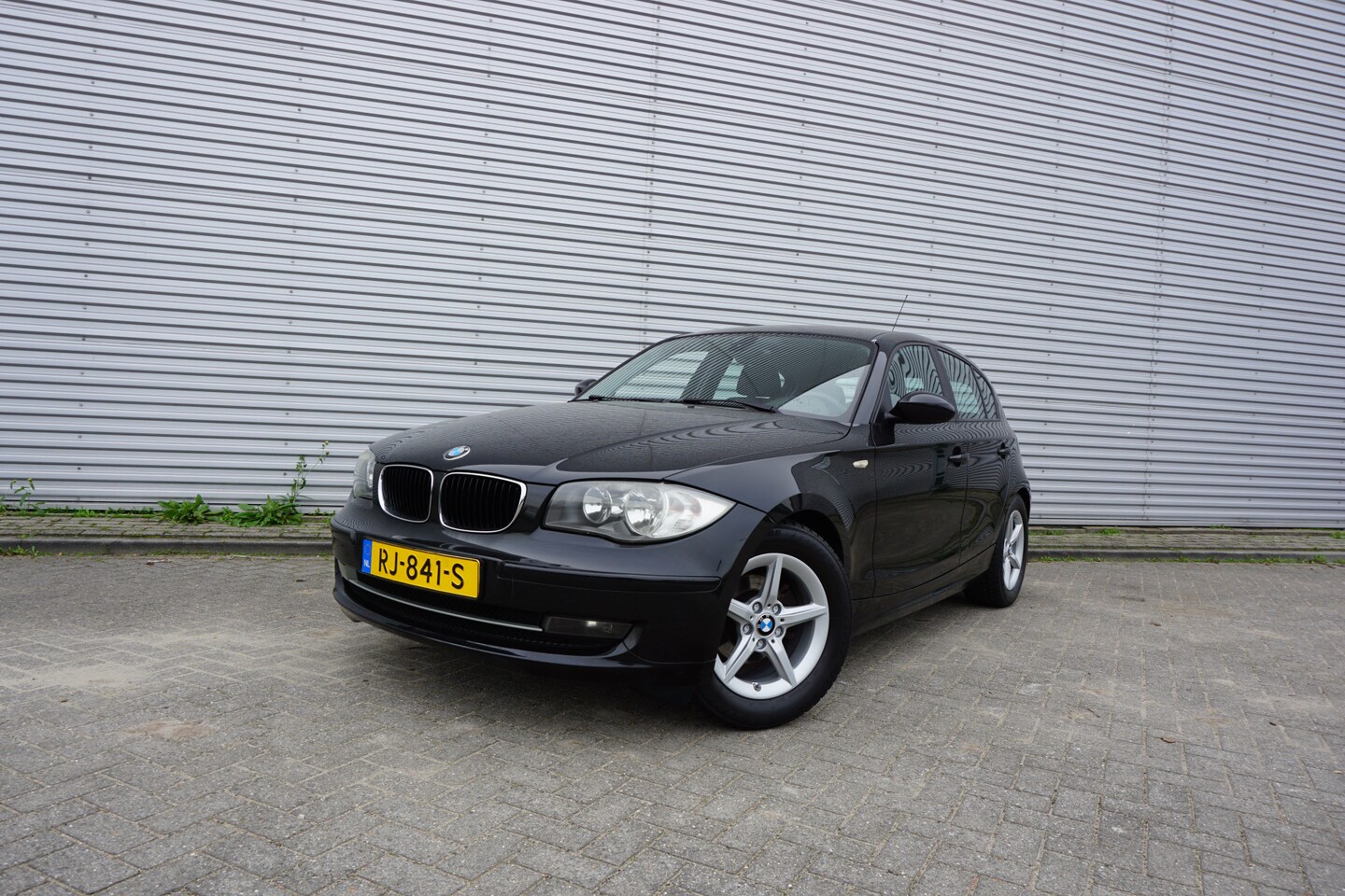 BMW 1-serie - 116i Airco / Elektr. ramen / Parkeers. / Lm velgen / Apk t/m 09-2027 - AutoWereld.nl