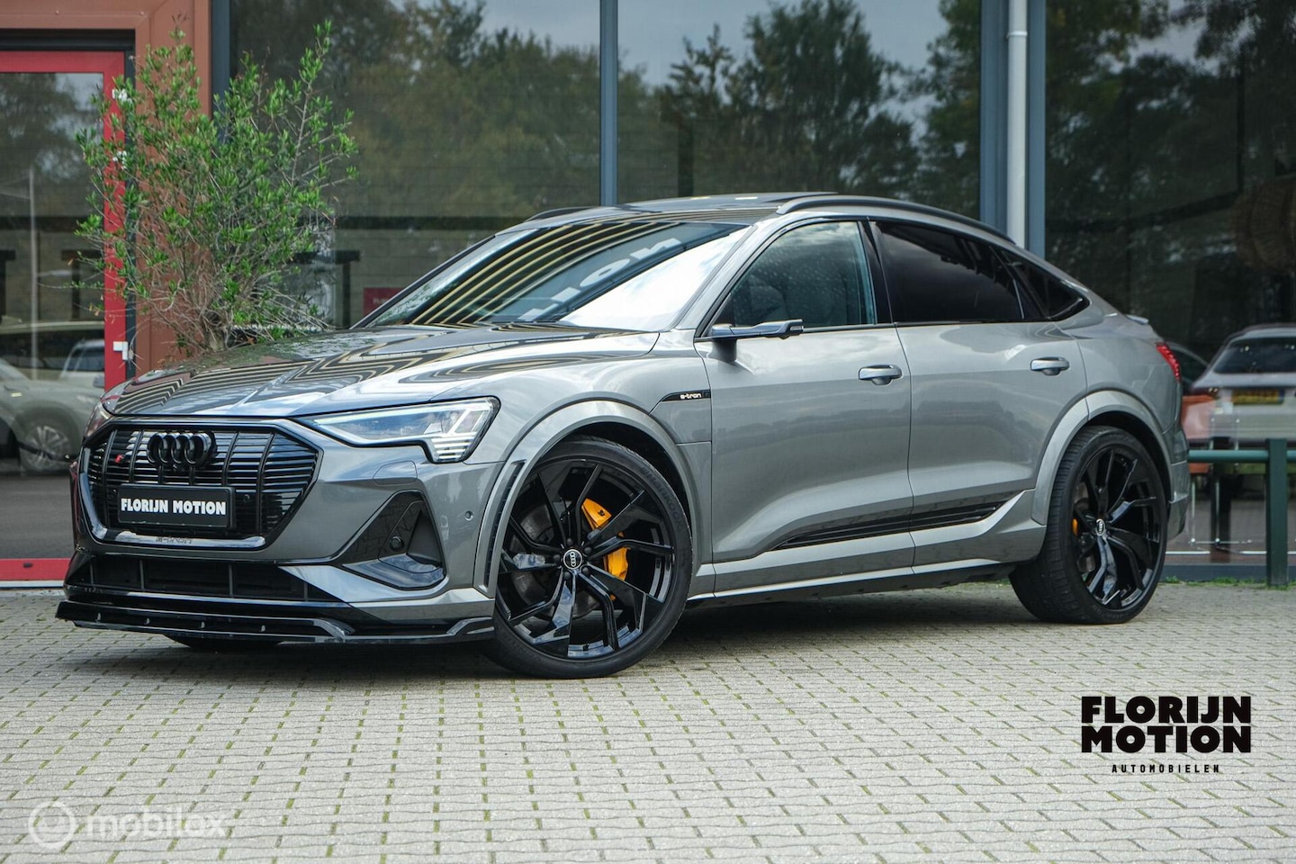 Audi e-tron Sportback - 55 quattro S edition 95 kWh | HUD | Bang & Olufsen | RS-zetels | Nightvision | 23" velgen - AutoWereld.nl