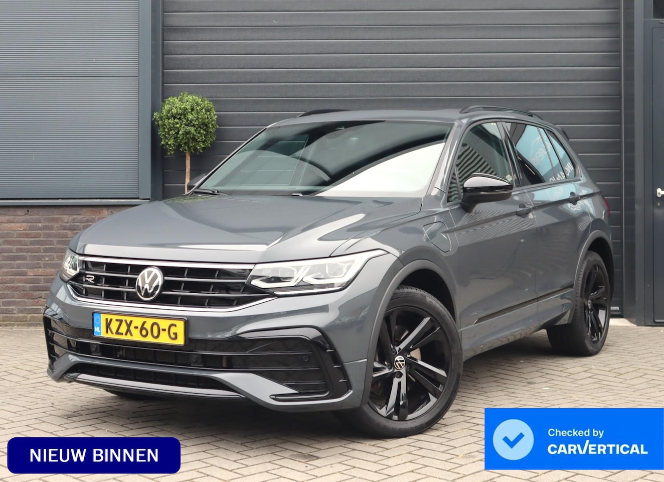 Volkswagen Tiguan - 1.4 TSI eHybrid R-Line Business+ | Pano | Camera | Trekhaak - AutoWereld.nl