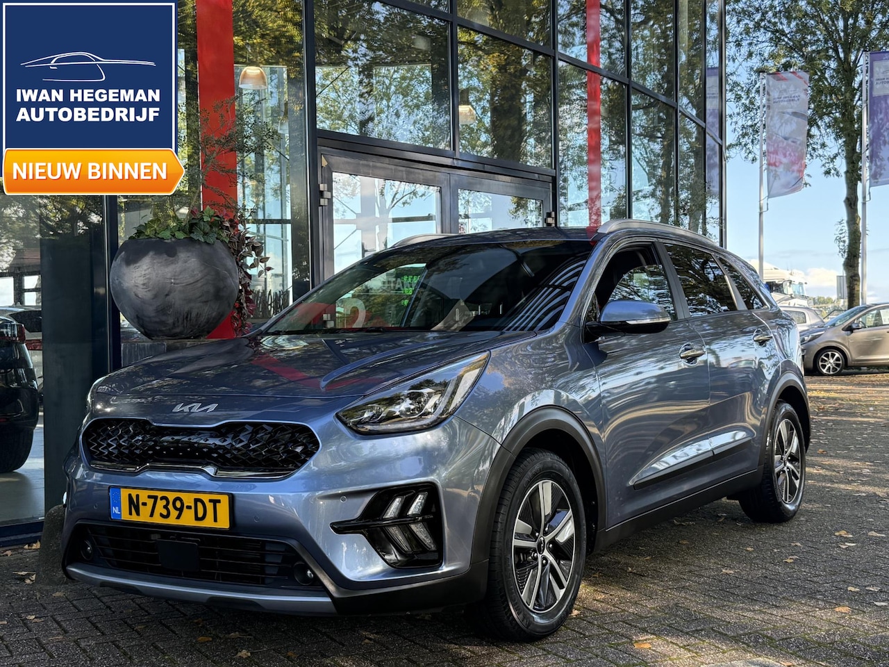 Kia Niro - 1.6 GDi Hybrid DynamicPlusLine | Afn. Trekhaak | Navigatie | Leder | PDC + Camera | Stoel/ - AutoWereld.nl