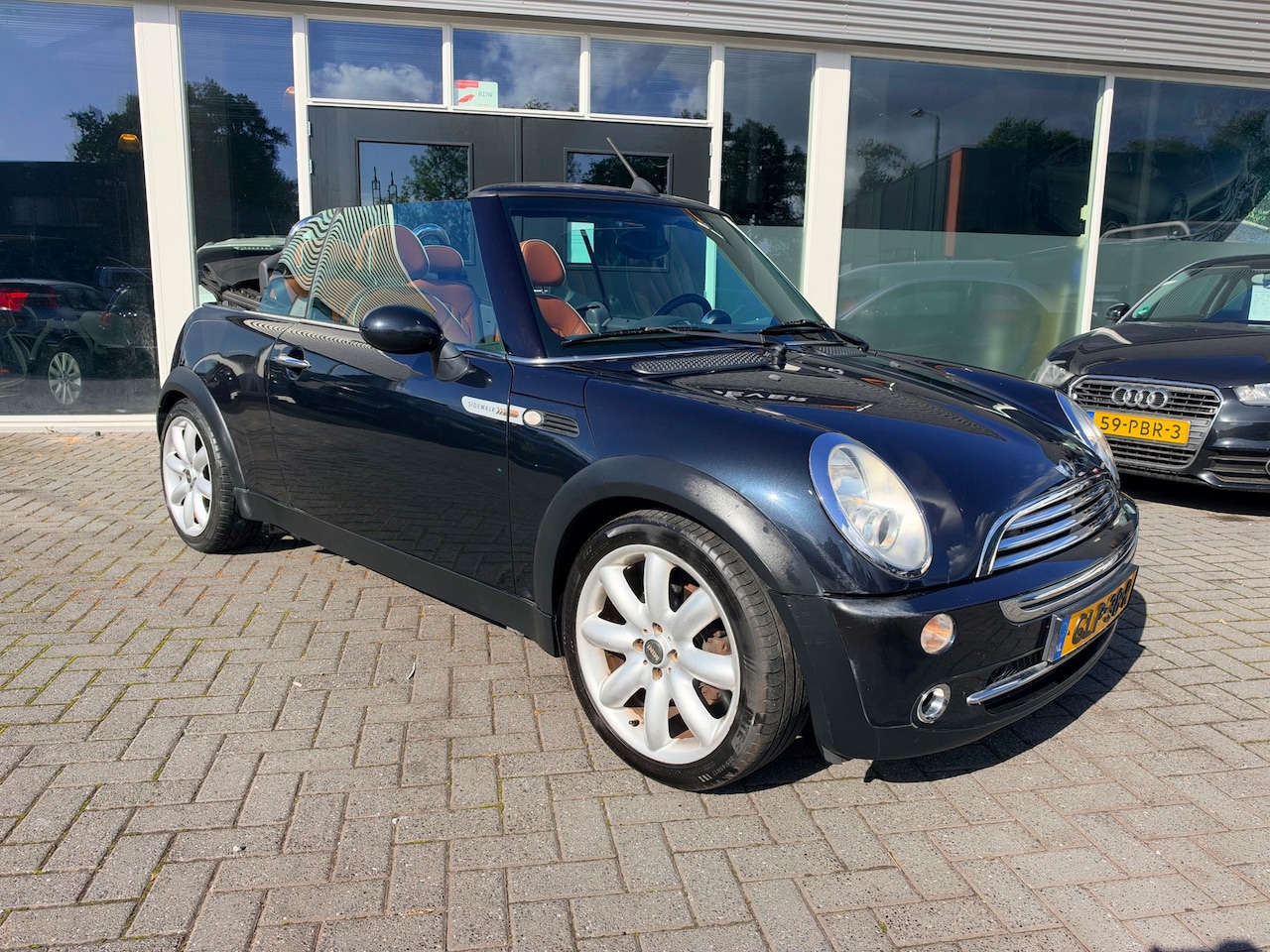 MINI Cabrio - 1.6 Cooper Sidewalk/Leer/Lichtmetaal/Cabriolet. - AutoWereld.nl