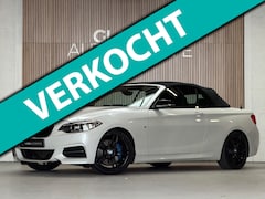 BMW 2-serie Cabrio - M235i - AUTOMAAT - PARELMOER WIT - LEER - NAVIGATIE - HARMAN KARDON - M PERFORMANCE UITLAA