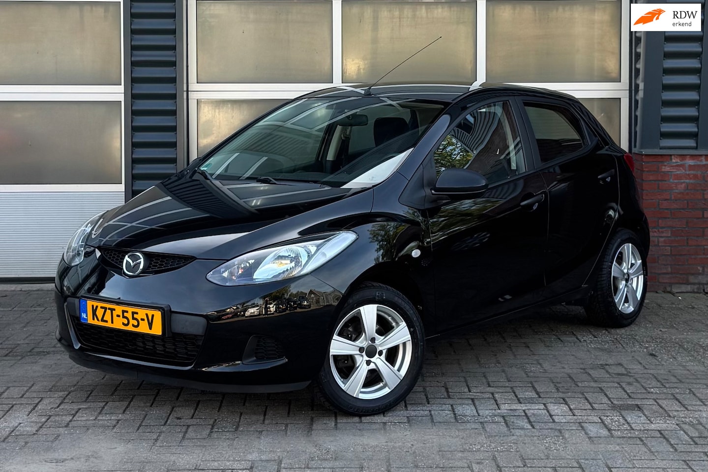 Mazda 2 - 1.4 | 75 PK | 129.588 km | Airco | Parkeersensoren | Lichtmetalen Velgen | 5-deurs - AutoWereld.nl