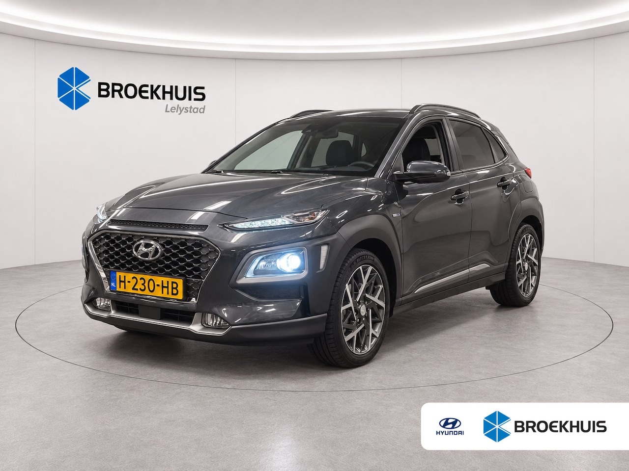 Hyundai Kona - 1.6 GDI HEV 105PK PREMIUM SKY AUTOMAAT / NAVI / LEDER / CLIMA / FULL-LED / PDC / CAMERA / - AutoWereld.nl