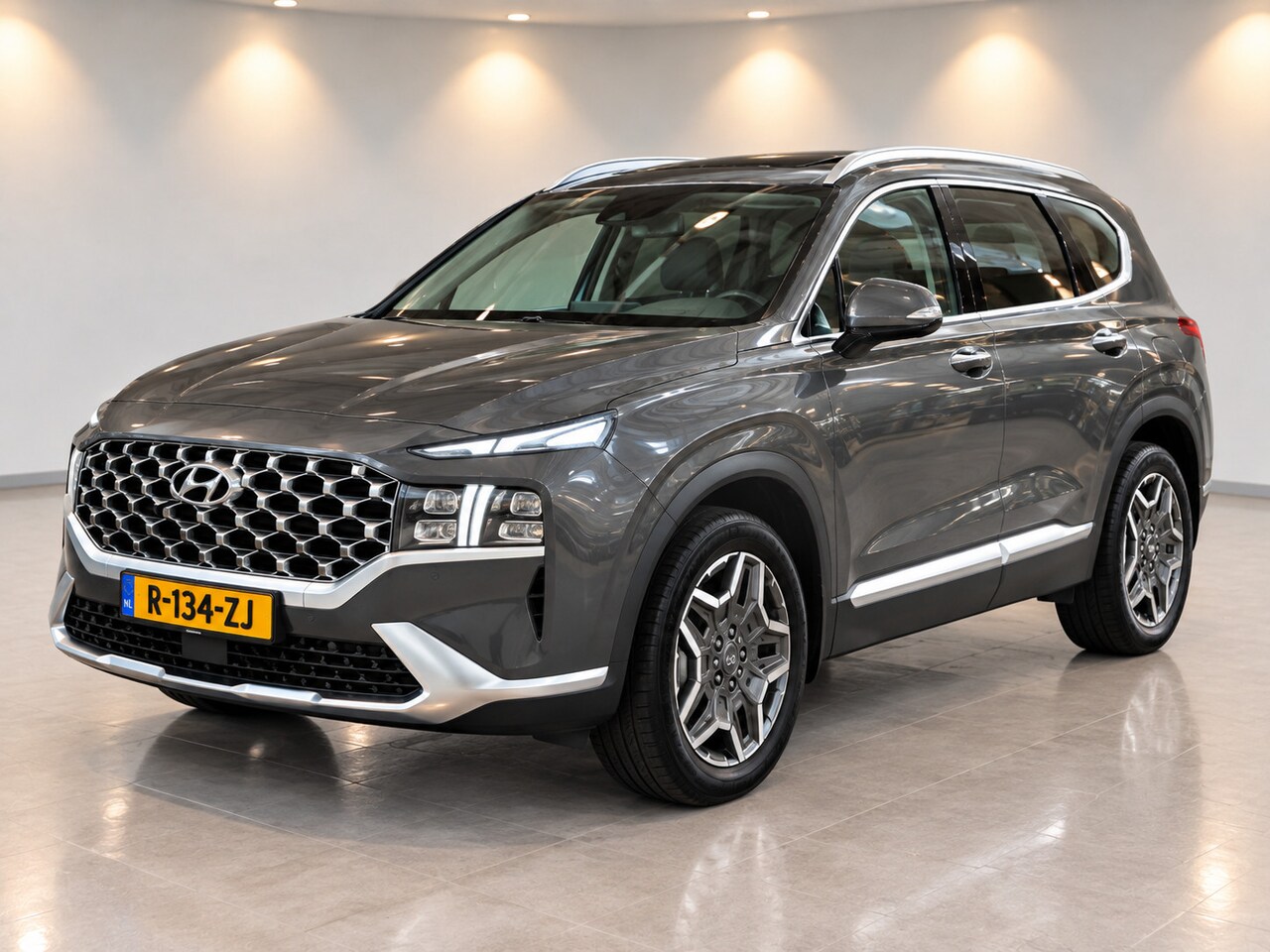 Hyundai Santa Fe - 1.6 T-GDI HEV Premium|1e Eig|Pano|Trekhaak|Leder|Dealer Onderhouden - AutoWereld.nl